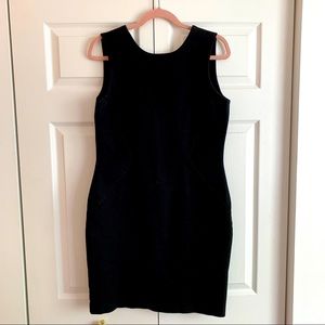Little black dress with low V back.
